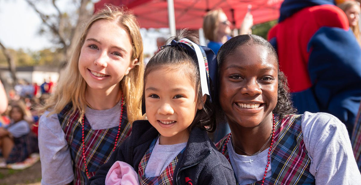 FWCD has an intentionally inclusive community. Three Fort Worth Country Day students together at the annual Founders Day celebration.